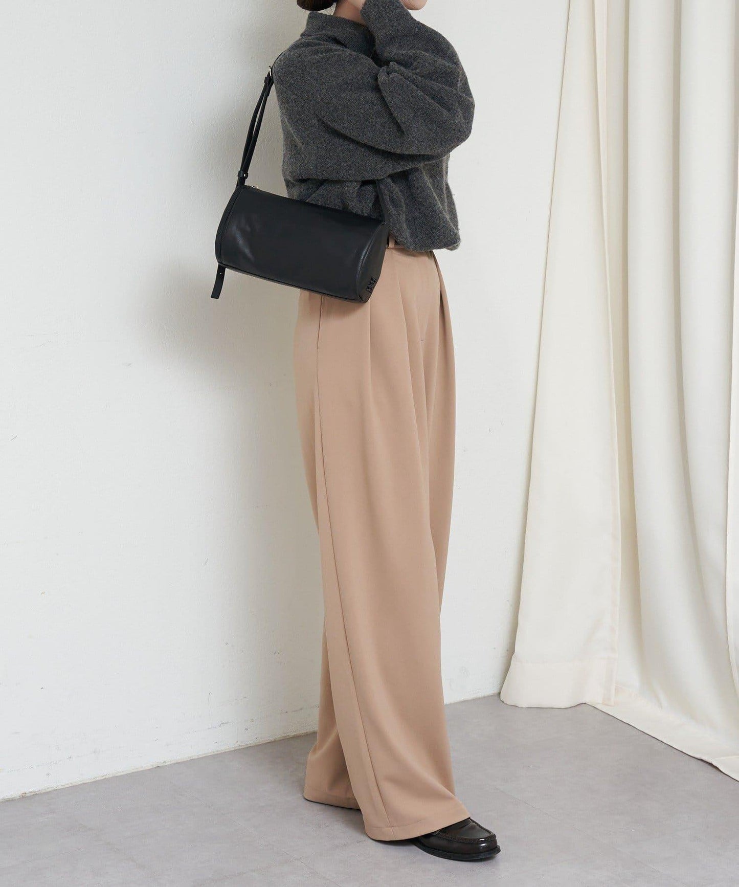 軟皮卷式單肩包