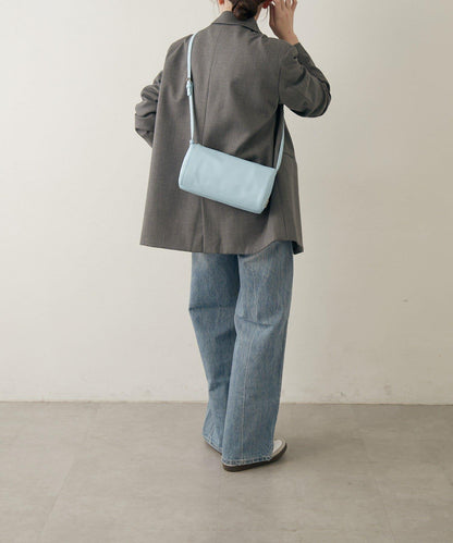 軟皮卷式單肩包