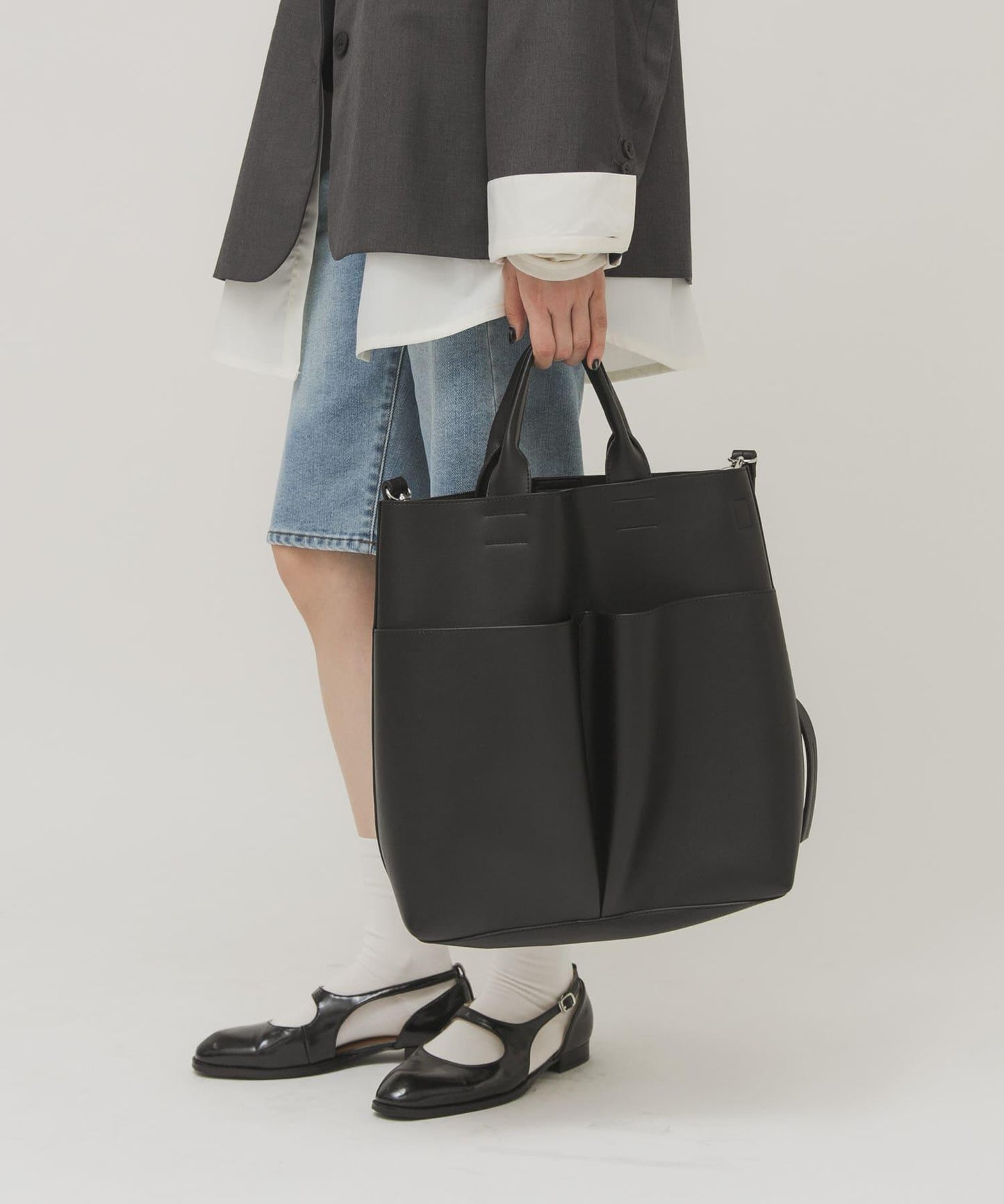 外口袋簡約設計 單肩包