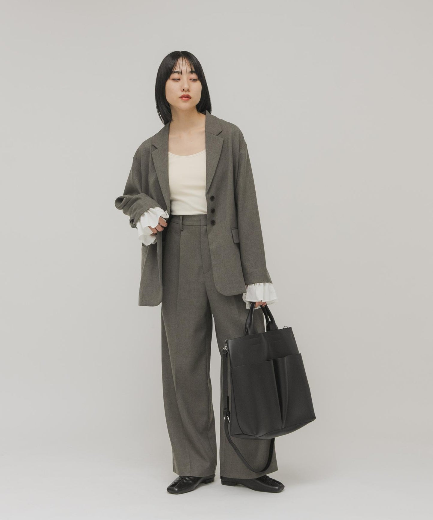 外口袋簡約設計 單肩包