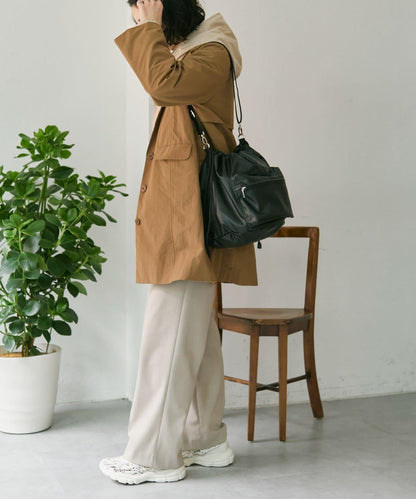 外口袋束口斜挎包