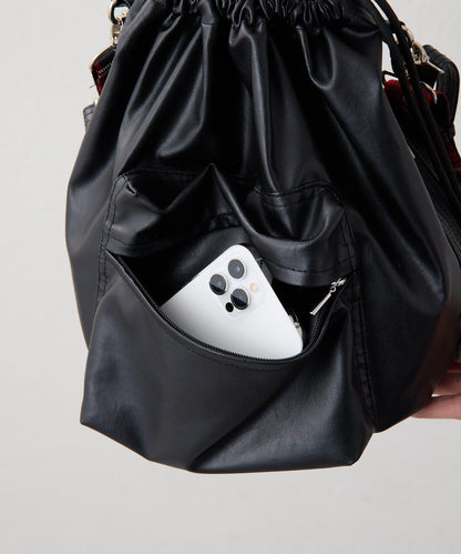 外口袋束口斜挎包