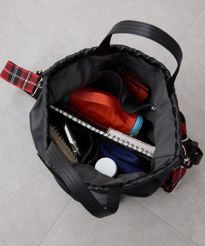 外口袋束口斜挎包