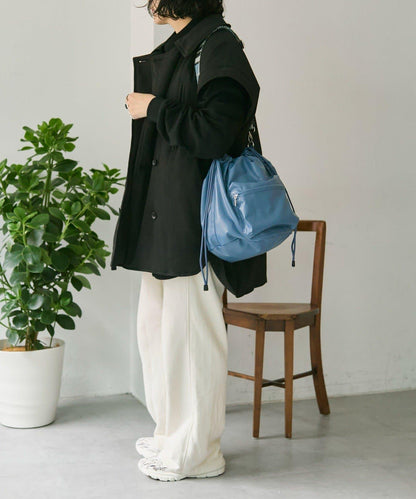 外口袋束口斜挎包