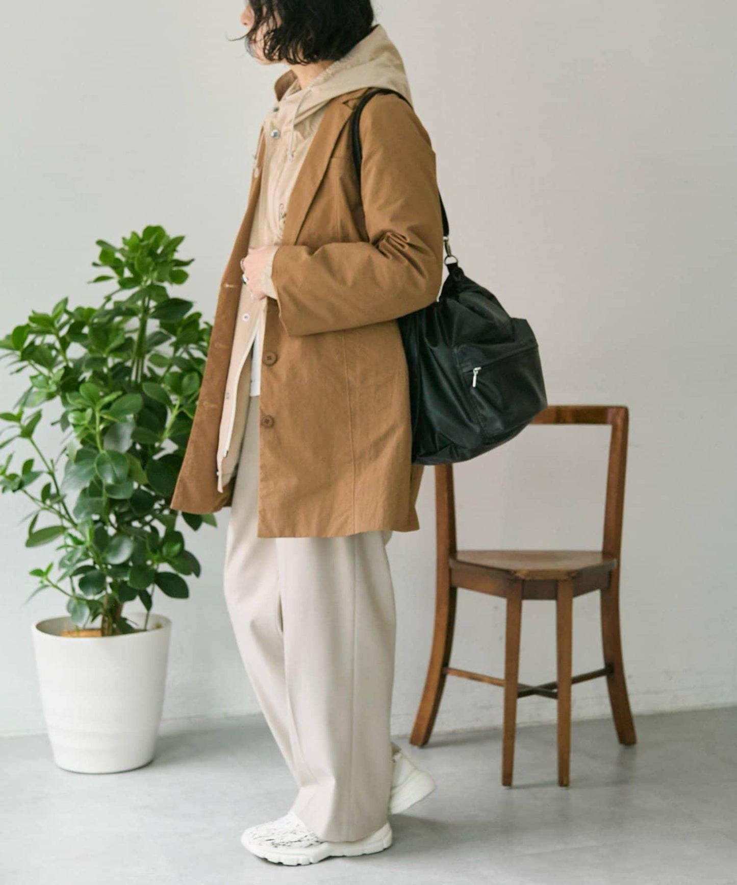 外口袋束口斜挎包