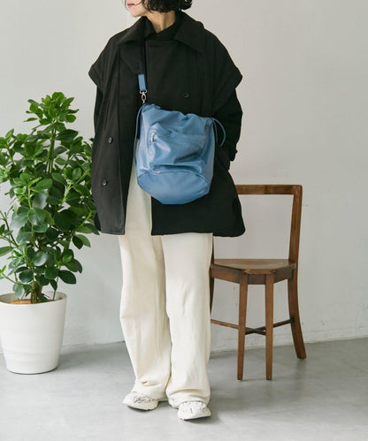 外口袋束口斜挎包