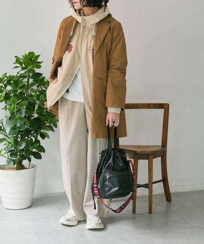 外口袋束口斜挎包