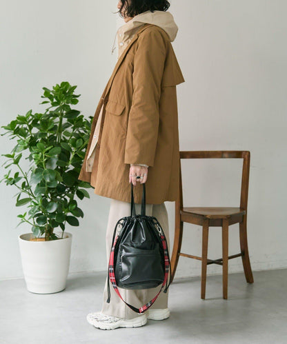 外口袋束口斜挎包