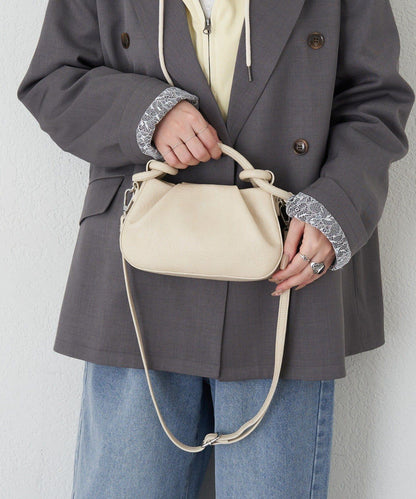 扭結設計迷你包