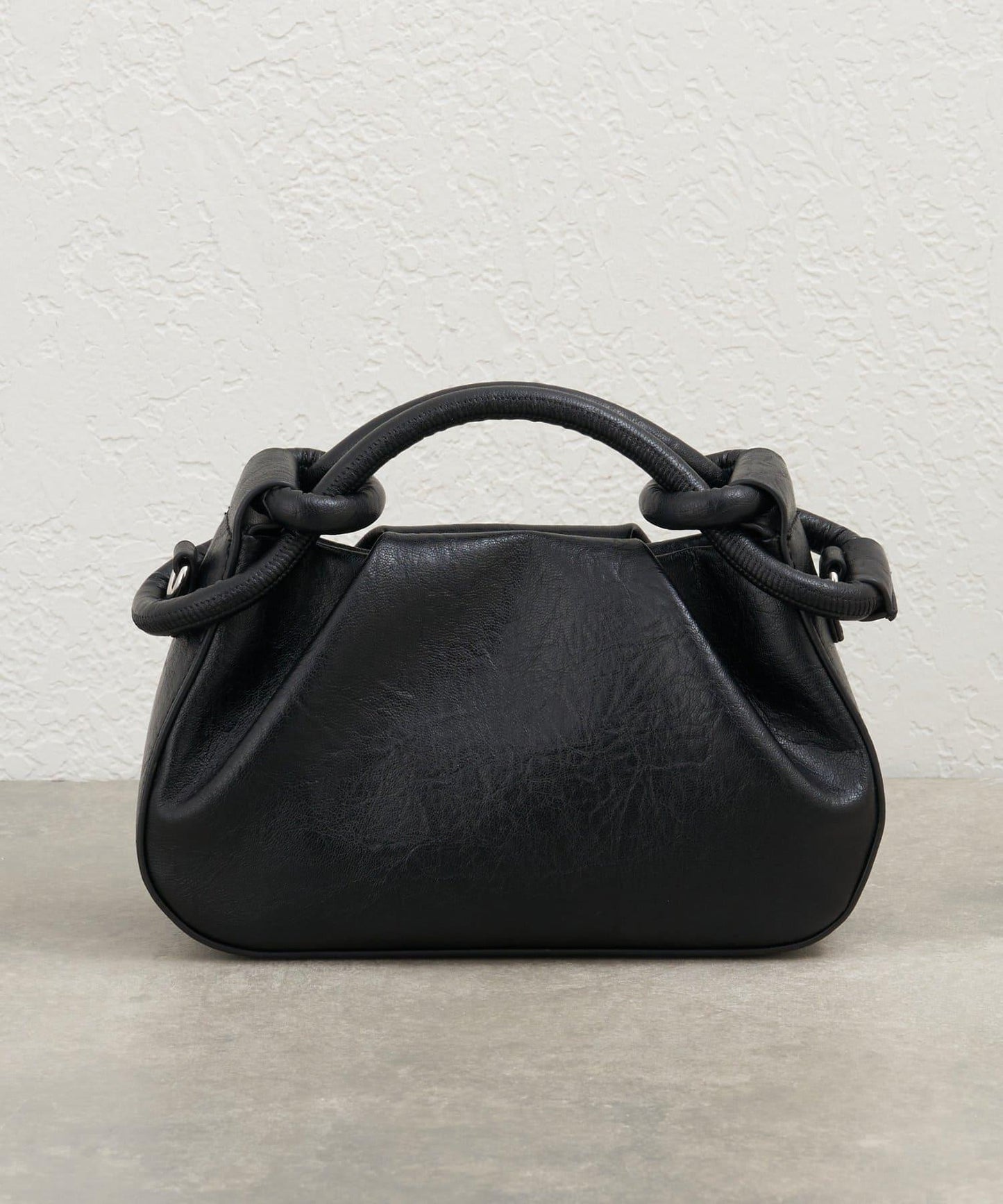 扭結設計迷你包