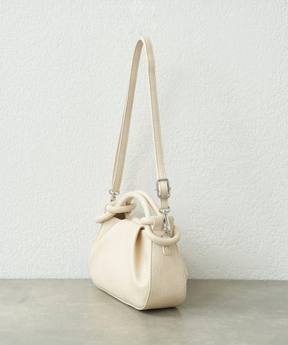 扭結設計迷你包