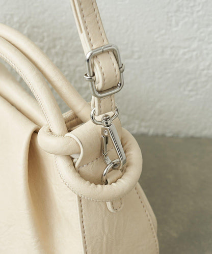 扭結設計迷你包