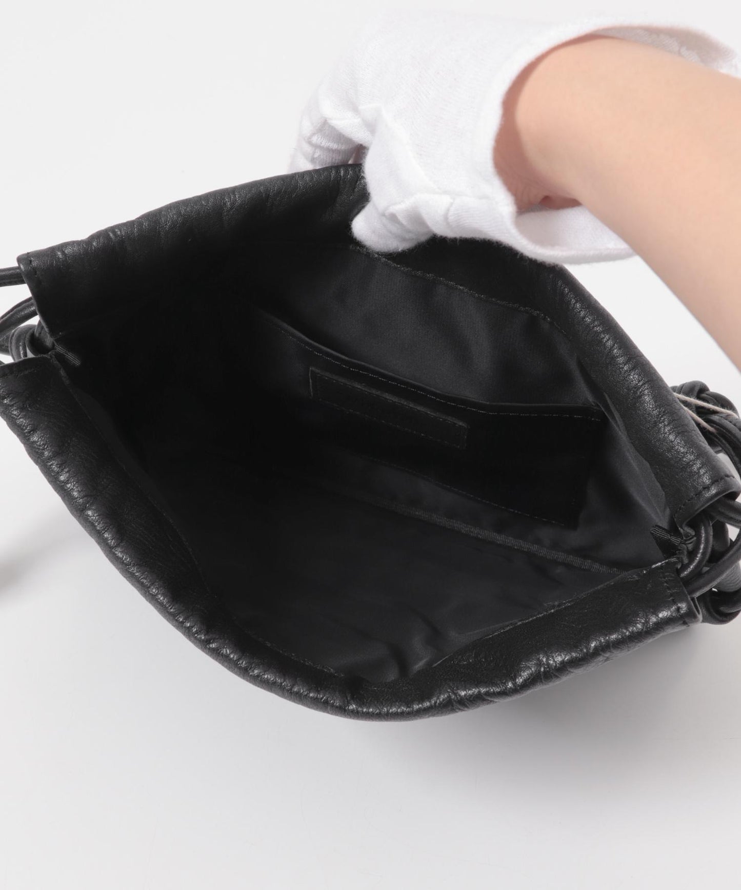 MORMYRUS 束口單肩包