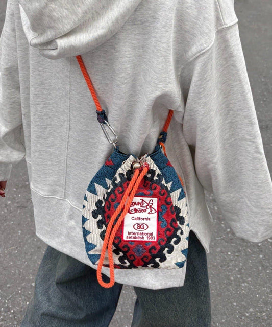 SOUNDSGOOOOD 提花束口包