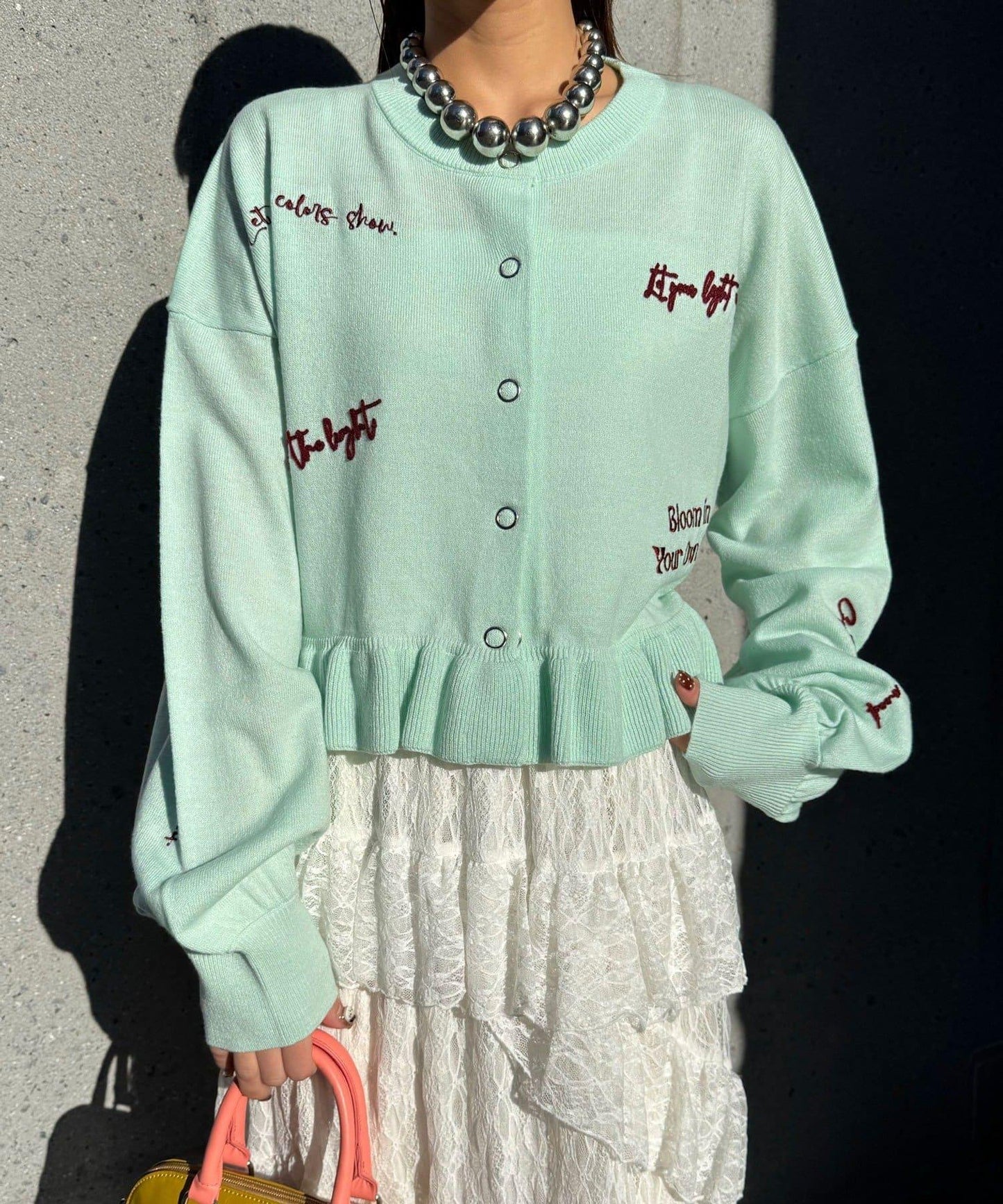 メッセージ刺繡ロゴフリルニットカーディガン