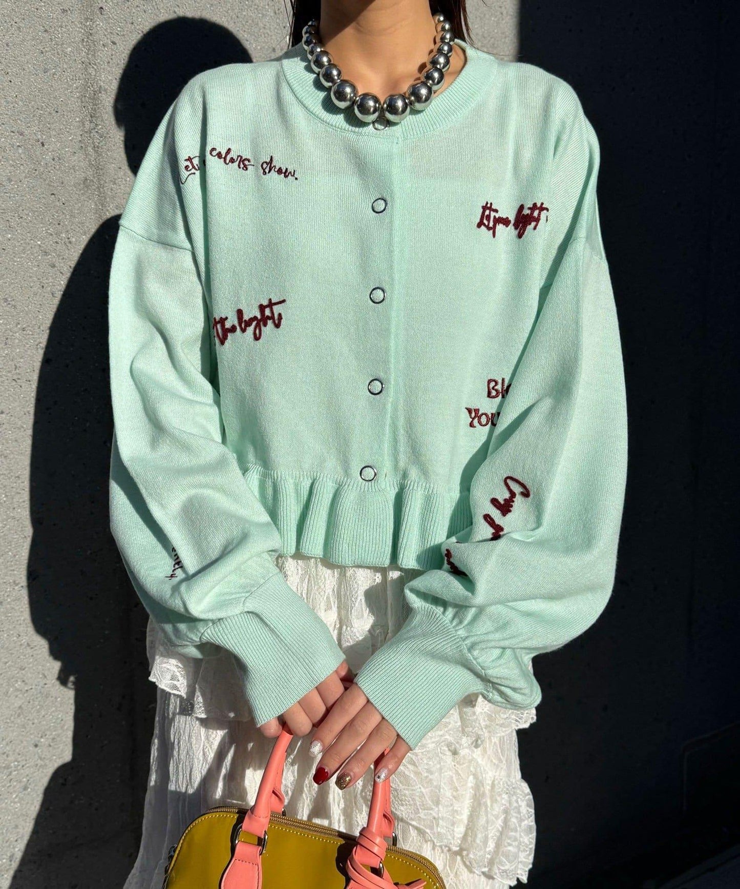 メッセージ刺繡ロゴフリルニットカーディガン