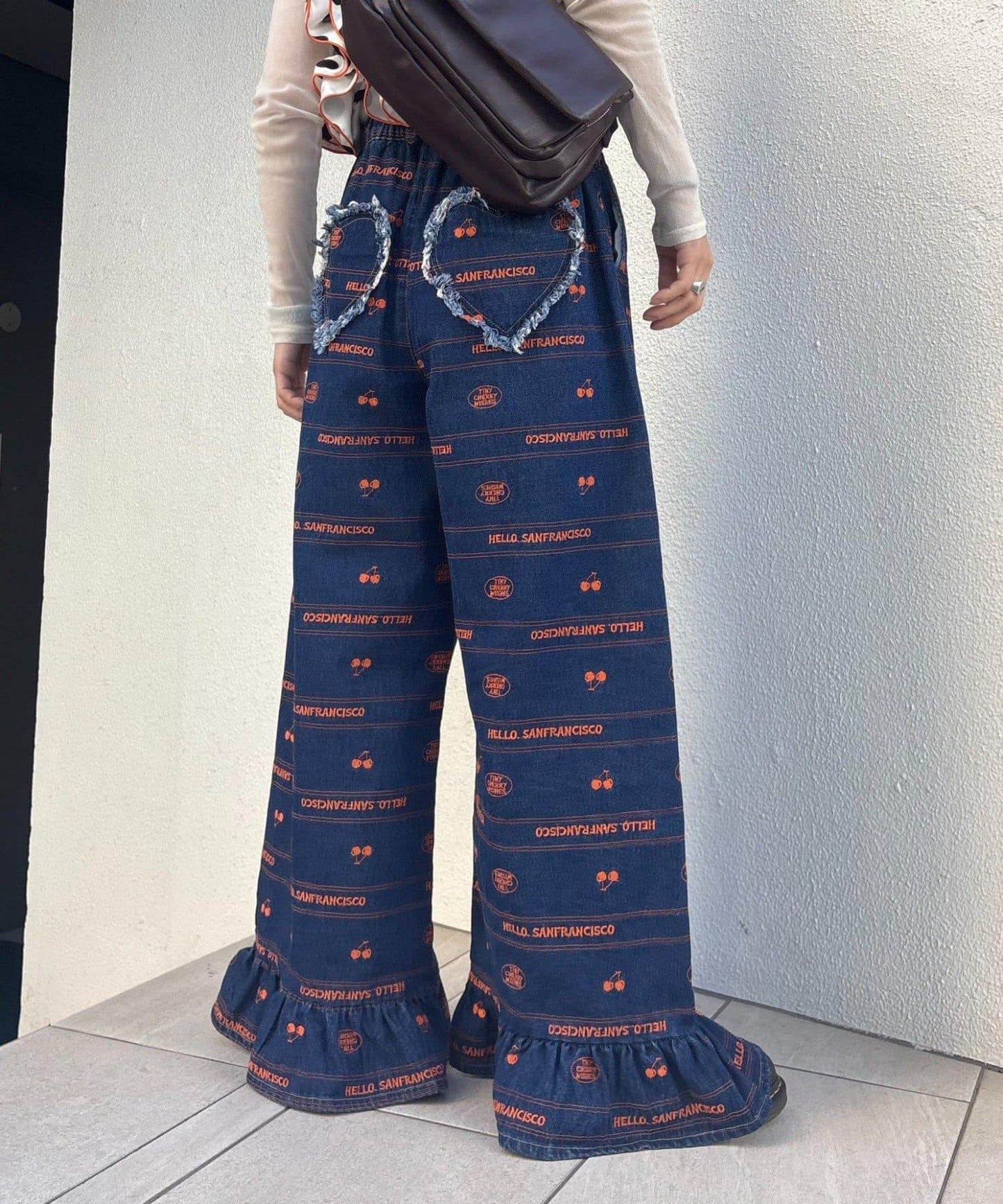 HELLO.SANFRANCISCO/ハローサンフランシスコ 褲腳荷葉邊滿版刺繡寬鬆牛仔褲