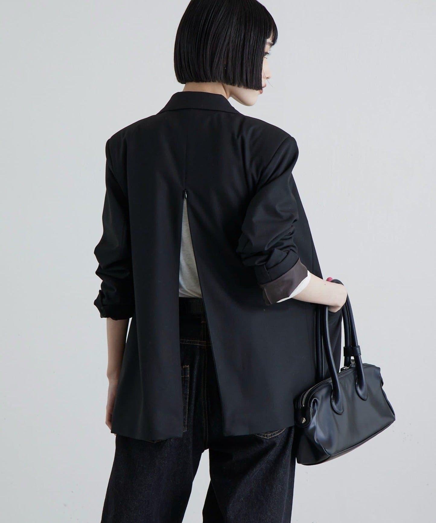 後拉鍊單排扣夾克