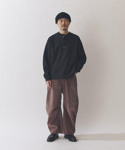 植絨弧形牛仔褲