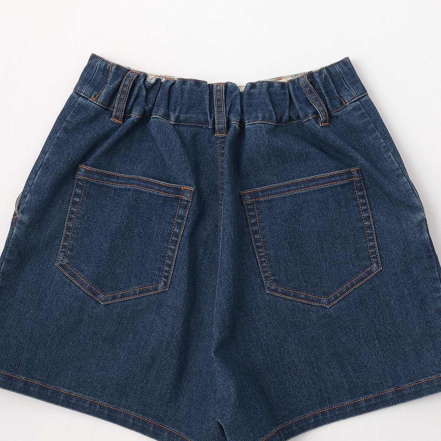 蝴蝶結刺繡 裹褶百褶設計 休閒短褲