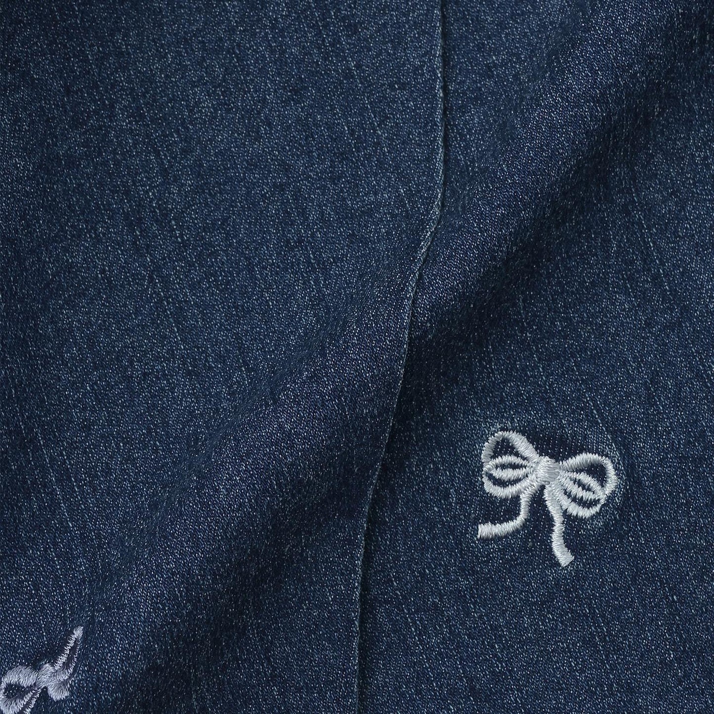 蝴蝶結刺繡 裹褶百褶設計 休閒短褲
