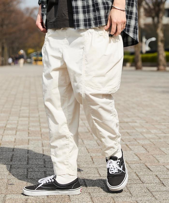 寬鬆彎刀版型 口袋抽繩設計 休閒工裝褲