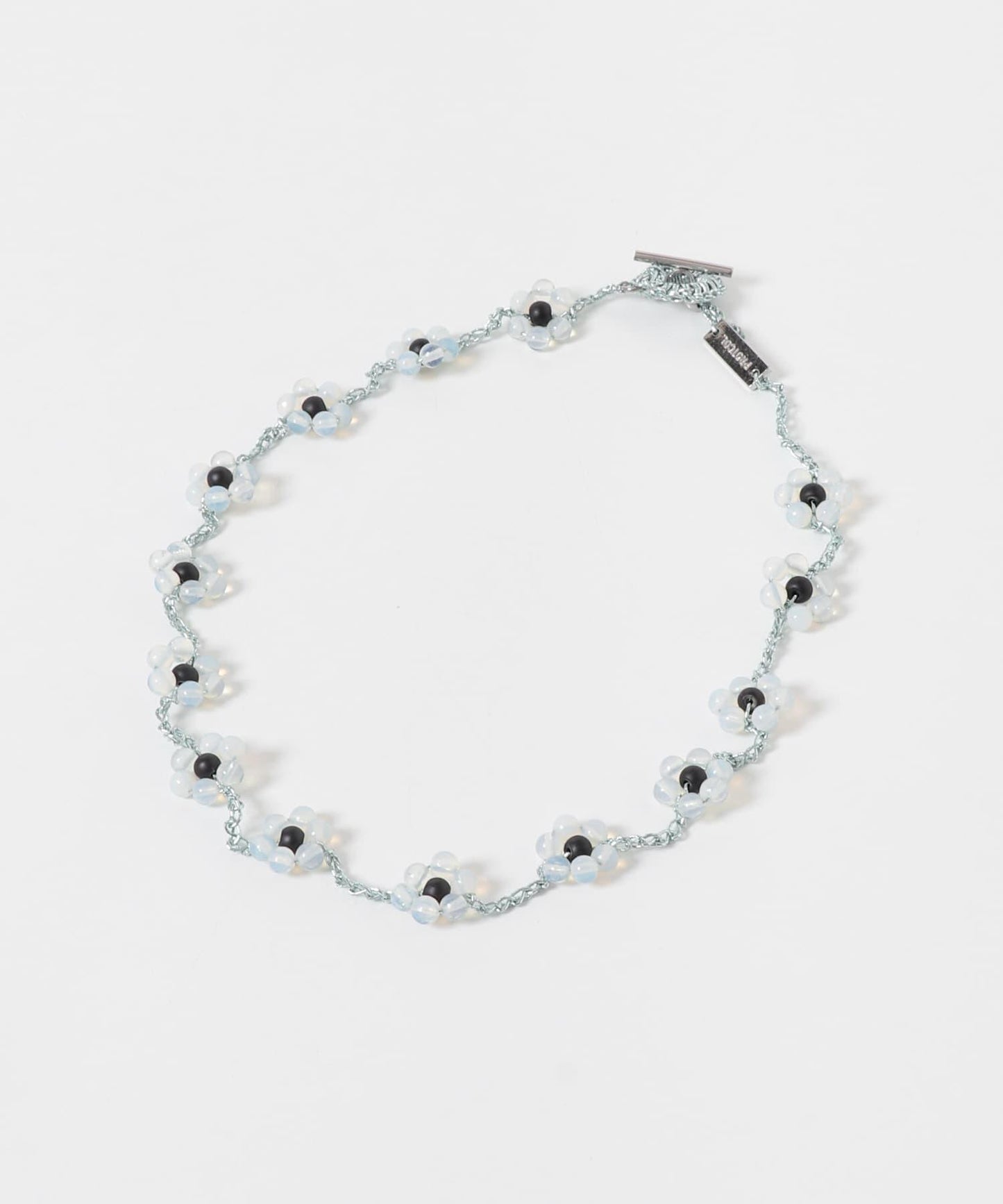 PROTCOL FLOWER NECKLACE