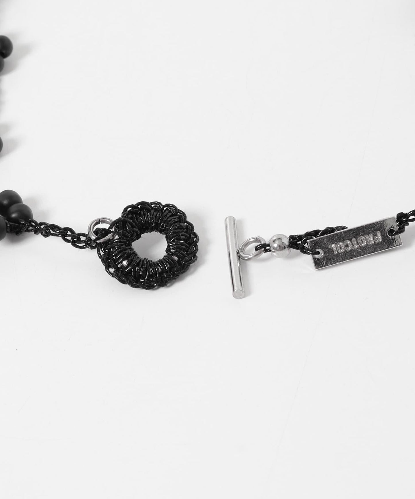 PROTCOL FLOWER NECKLACE