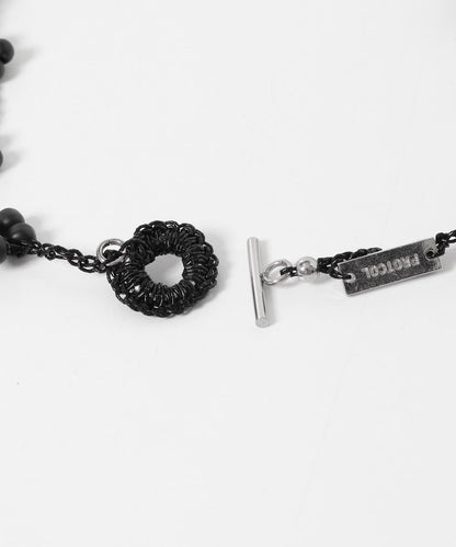PROTCOL FLOWER NECKLACE