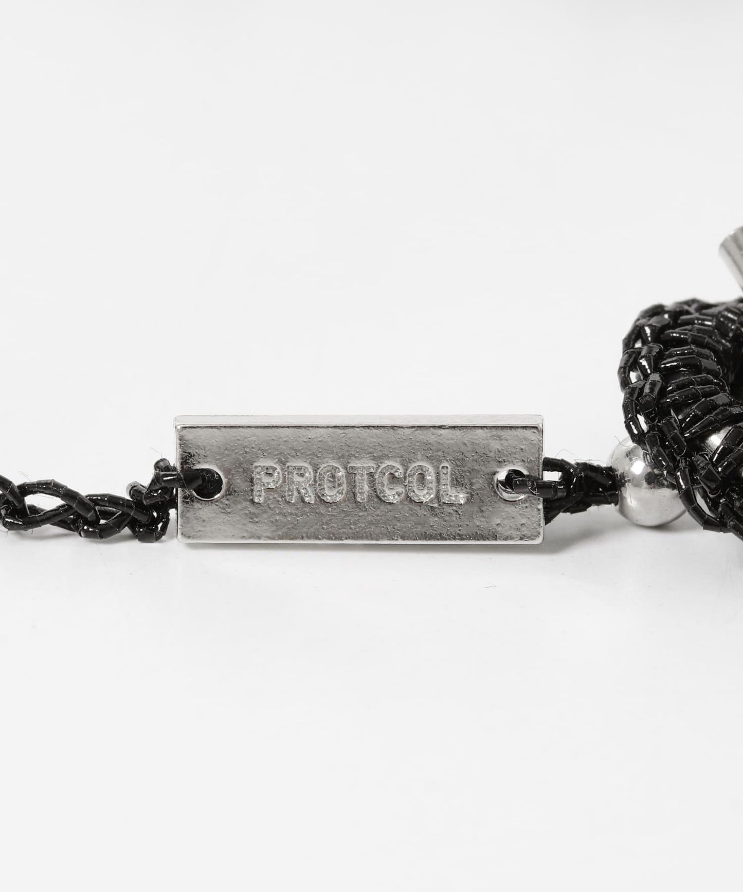 PROTCOL FLOWER NECKLACE