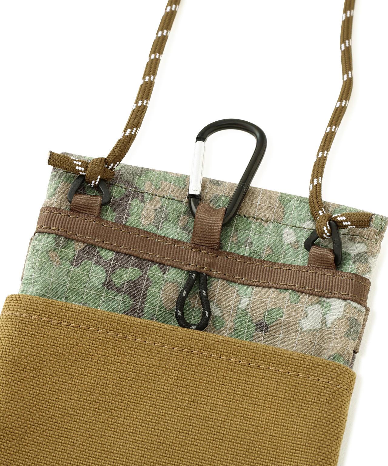 REFLECT RIP VERTICAL POCHETTE 小包（直營店限定）
