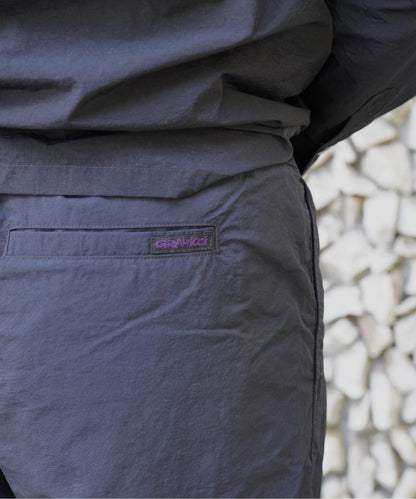 聯名 NYLON TUCK PANTS 尼龍褶襉褲