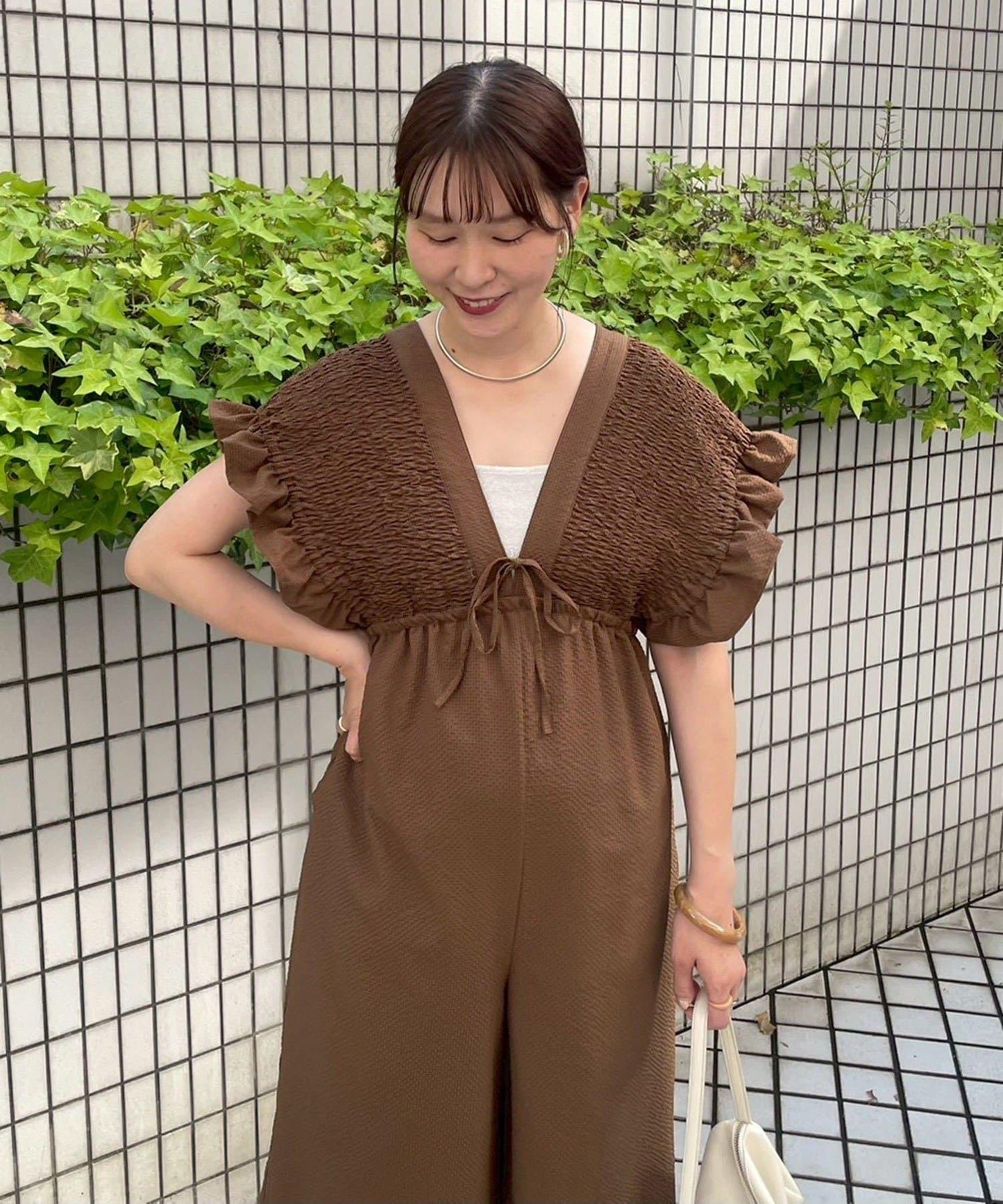 シャーリングフリルロンパース