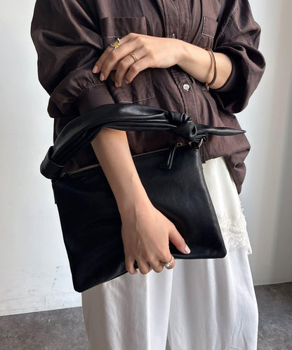 蝴蝶結手柄燕子包型斜挎包