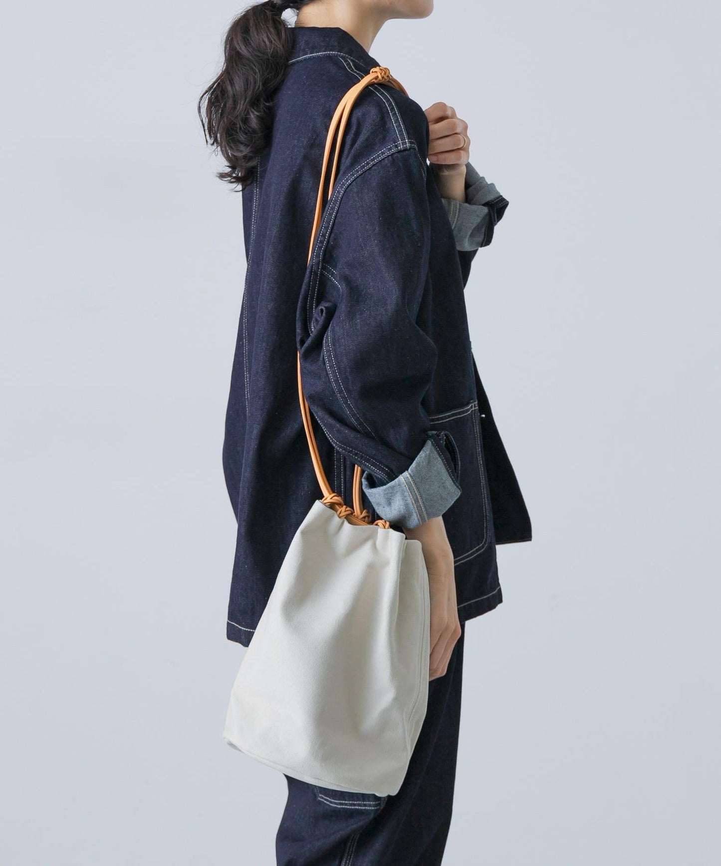 KAMARO’AN WOVEN DRAWSTRING BUCKET