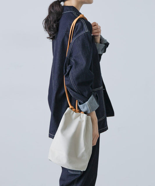 KAMARO’AN WOVEN DRAWSTRING BUCKET