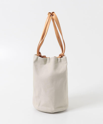 KAMARO’AN WOVEN DRAWSTRING BUCKET