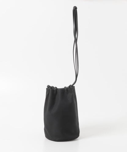KAMARO’AN WOVEN DRAWSTRING BUCKET
