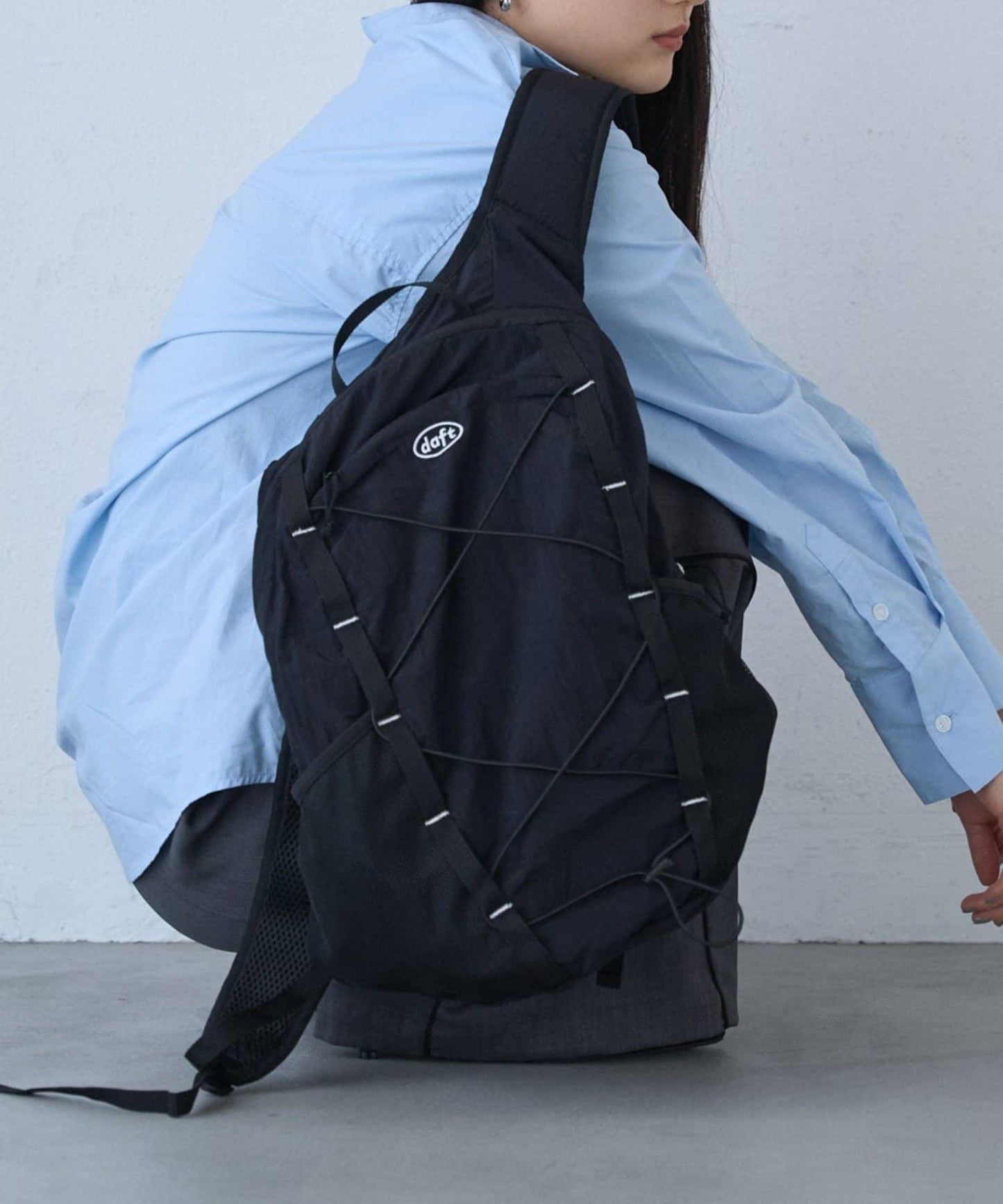 防潑水防撕裂抽繩雙肩包