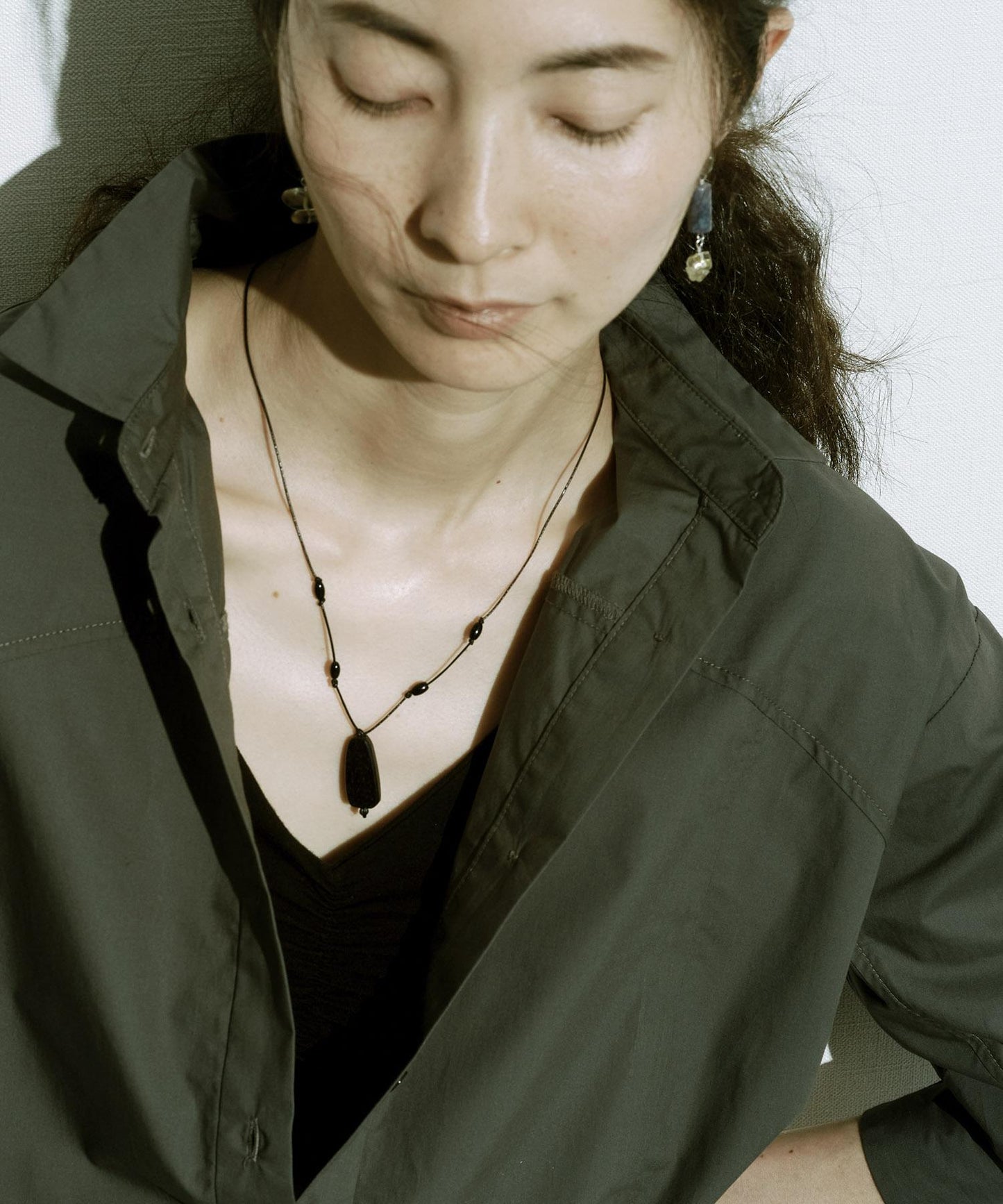 SMELLY so’ onyx accent wood necklace