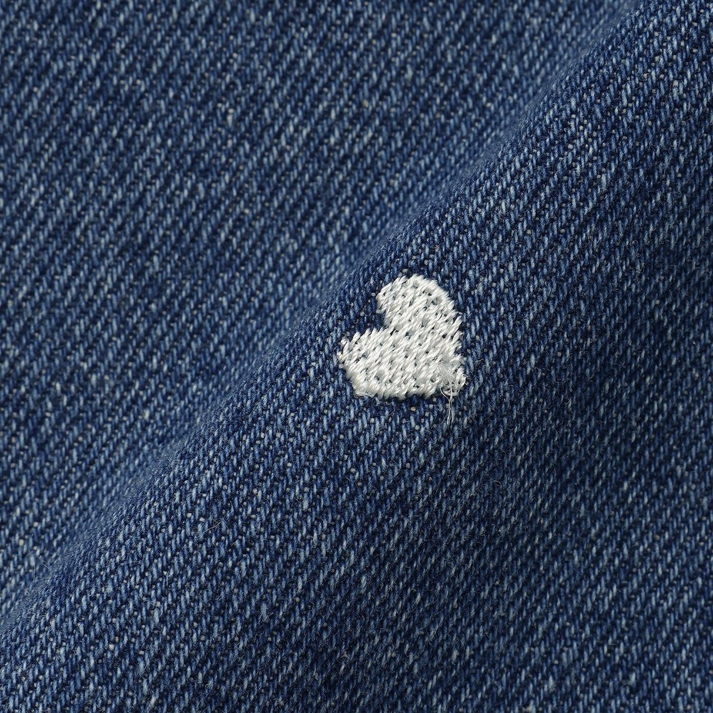 柔軟牛仔 愛心刺繡滿印彎刀褲