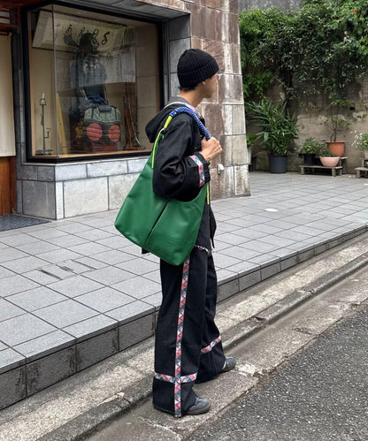 SOUNDS GOOOOD 三角皮革包