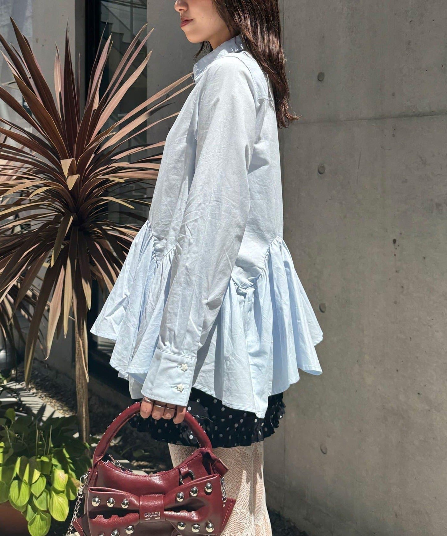 星紐扣波浪邊下襬襯衫式上衣