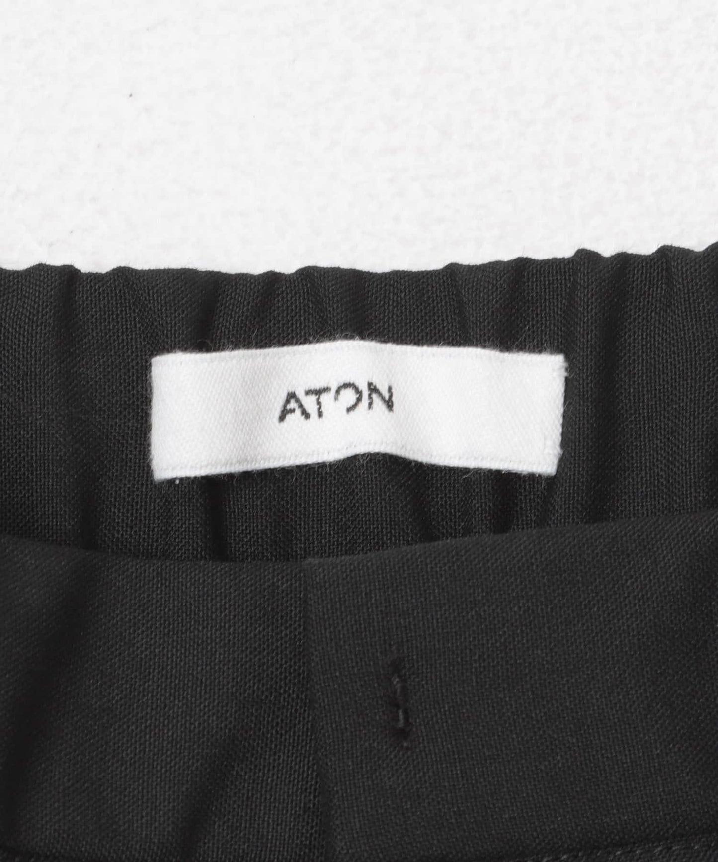 ATON WOOL TROPICAL PIN TUCK PANTS