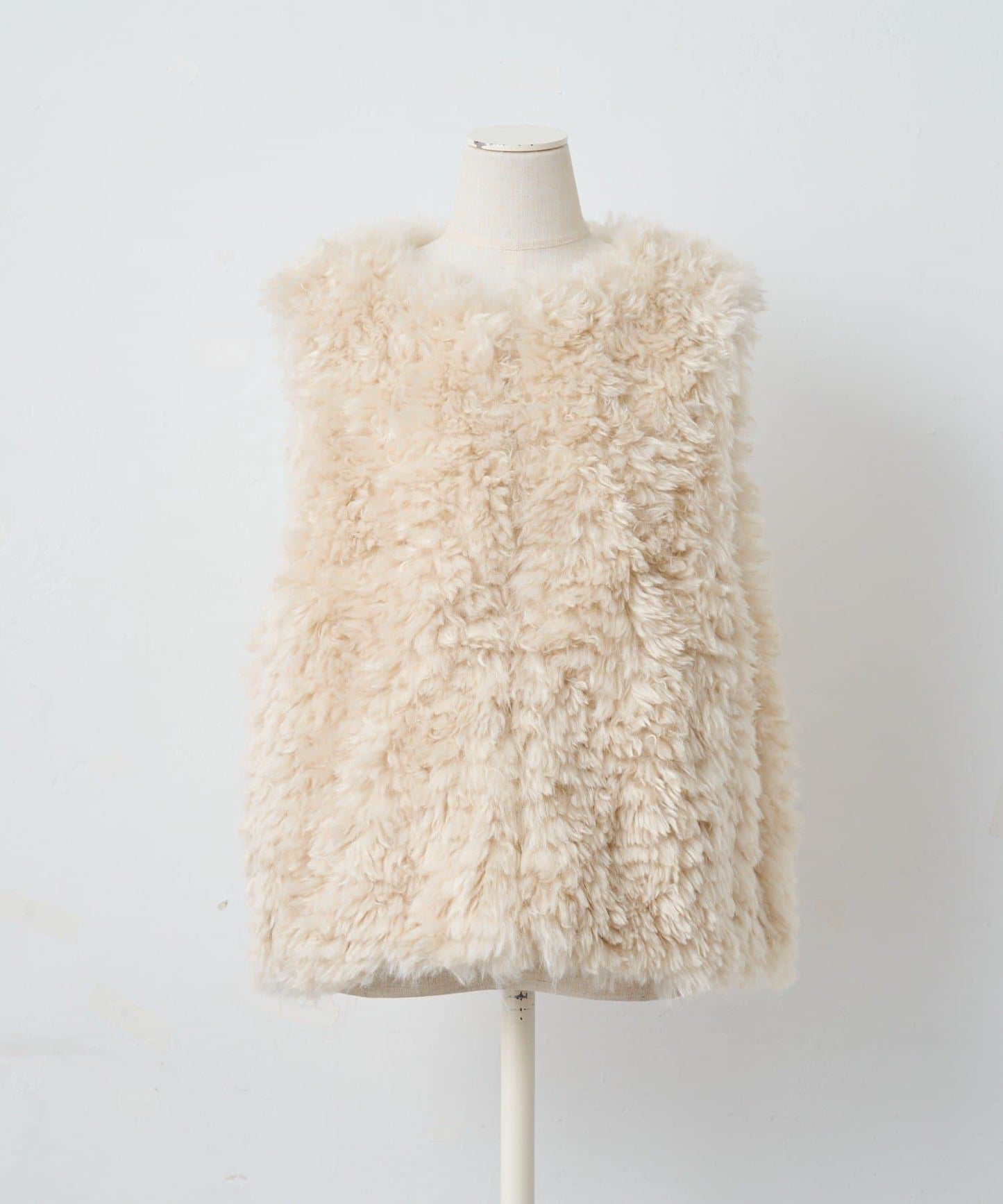 カーリーファーベスト